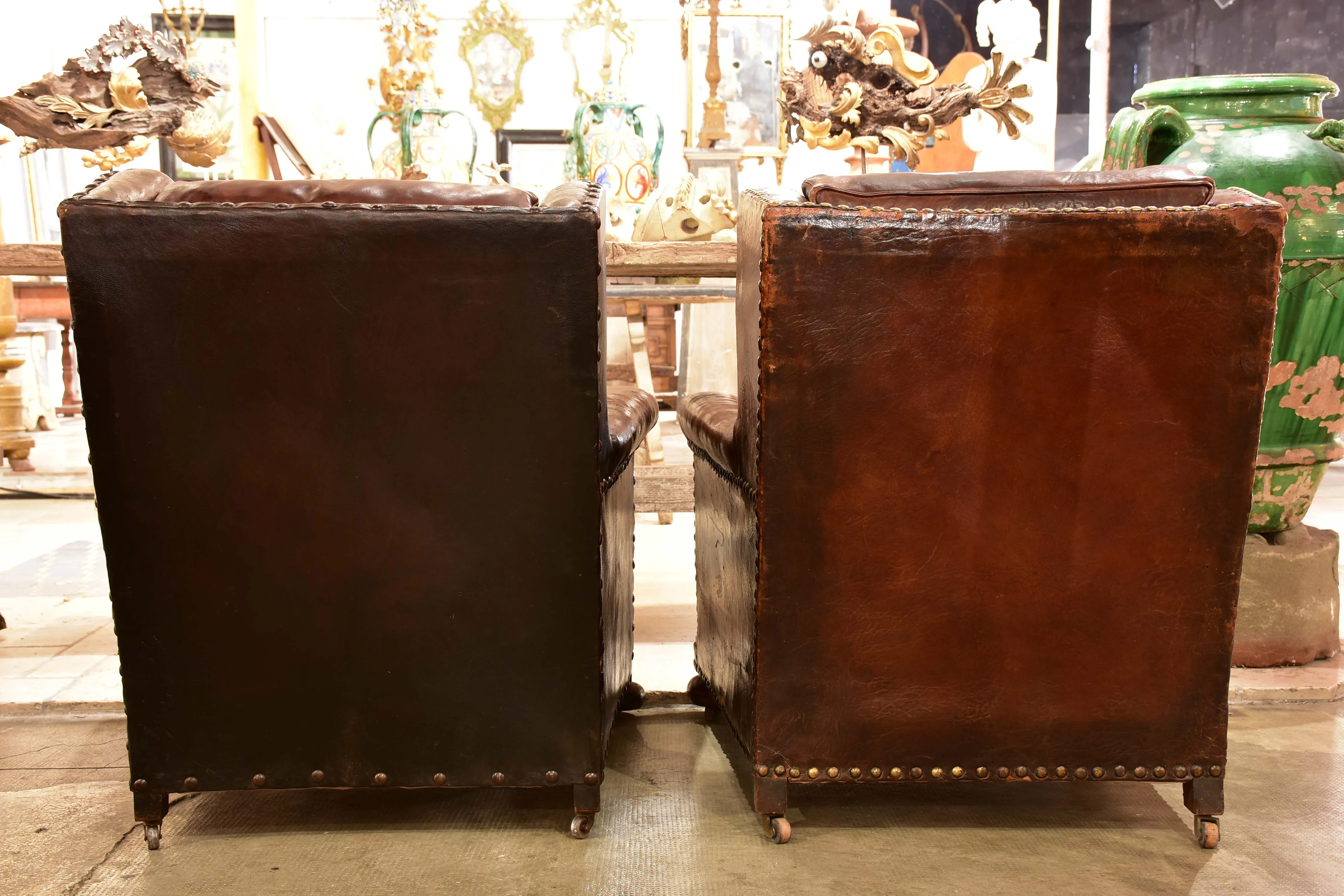 False pair of vintage French wingback club chairs